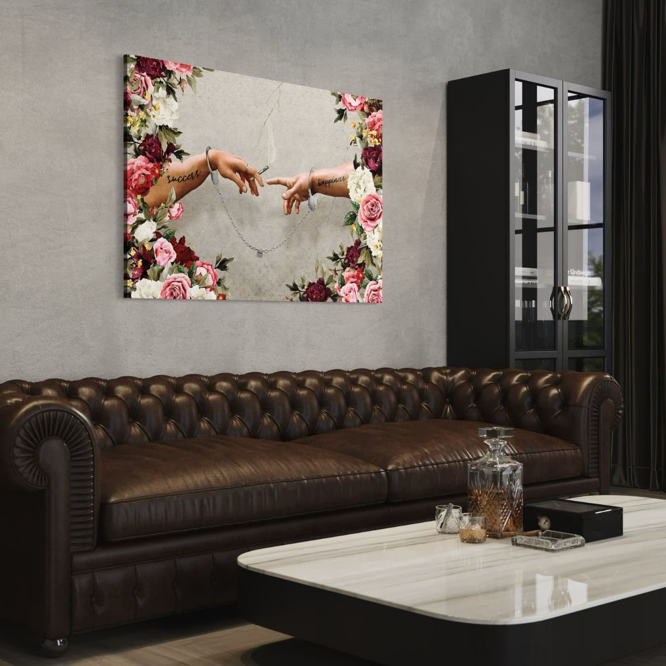 Modern schilderij met bloemen en symbolische handen boven leren bank