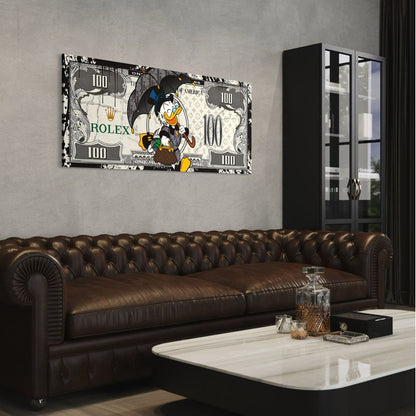 Canvas wanddecoratie met cartoon eend, paraplu en geldtas boven leren bank