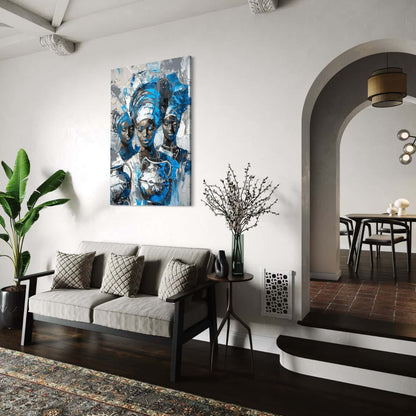 canvas schilderij van drie afrikaanse vrouwen in witte woonkamer