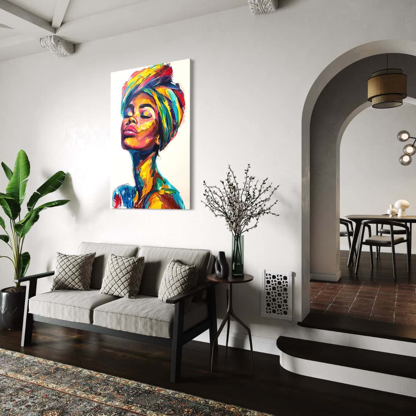 canvas schilderij van afrikaanse vrouw met veel kleur in witte woonkamer