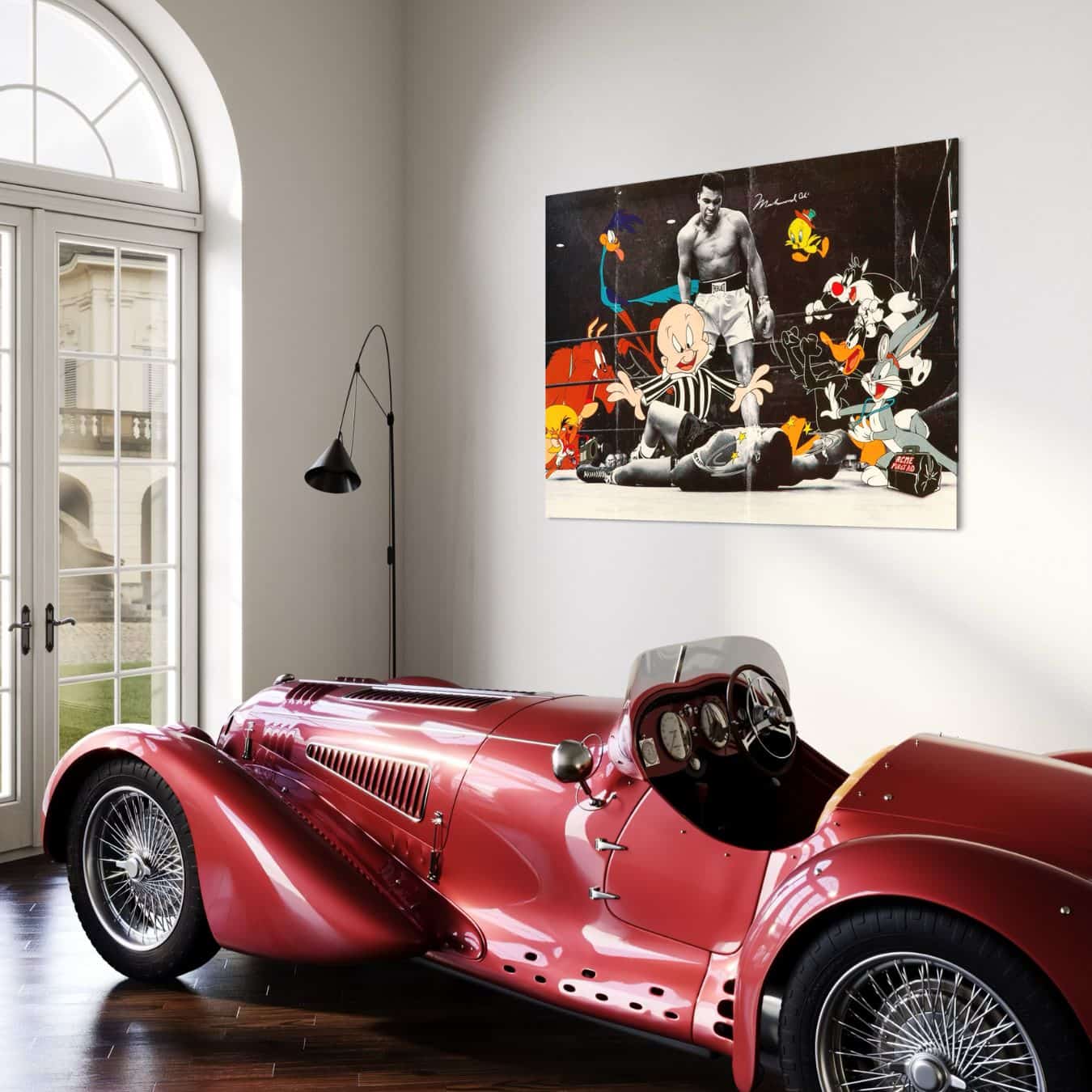 Kleurrijke muurdecoratie met Muhammad Ali en Looney Tunes figuren.